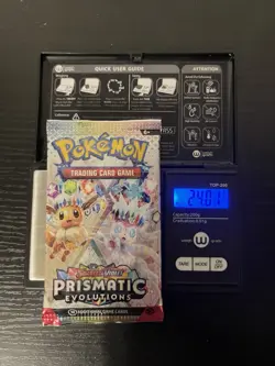 Pokemon TCG Prismatic Evolutions Booster Pack Heavy 24.01 Grams Factory Sealed - Image 1
