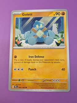 Pokemon TCG card - Golett 87/162 - Scarlet & Violet Temporal Forces - Non-Holo - Image 1
