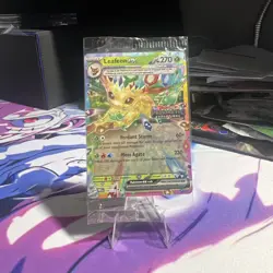 Pokemon Prismatic Evolutions Leafeon ex 006/131 Surprise Box Stamped - Sealed - Image 1