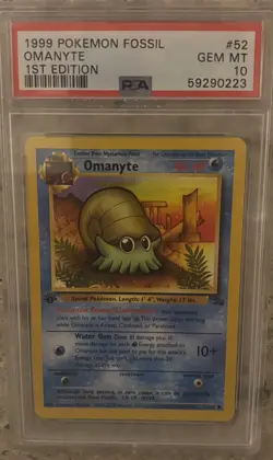 1999 Pokemon Fossil Omanyte 1st Edition #52 PSA 10 - Image 1