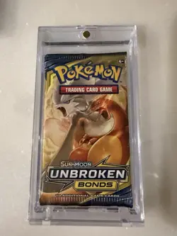 Pokemon Sun & Moon Unbroken Bonds Booster Pack + Acrylic Case - Image 1