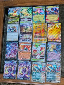 (16x JUMBO Cards) Pokemon Card Lot, Charizard 25th Anniversary , Eeveeloution - Image 1