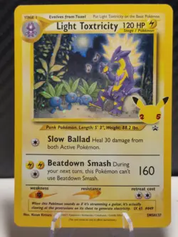 Pokemon TCG Light Toxtricity SWSH137 Celebrations Promo Card - Image 1