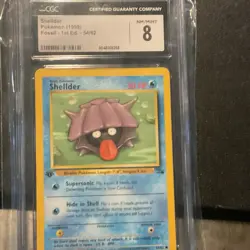 Pokemon TCG Shellder 54/62 Fossil 1st Edition Regular CGC 8 Wizards of the Coast - Image 1