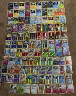 100+ Pokemon Card Lot Bulk Holo/Reverse HP/DMG Mixed Collection - Image 1
