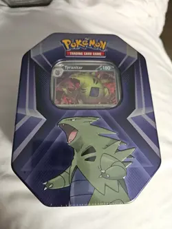 Pokeman Trading Card Game Tin With 3 Foil Cards And 3 Booster Packs. - Image 1