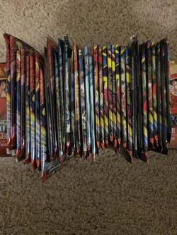 34 Packs Pokemon bulk regulars and holo cards and codes included unused - Image 2