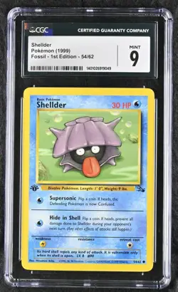 CGC MINT+ 9 Pokemon Shellder 54/62 1999 Fossil 1st Edition - Image 1
