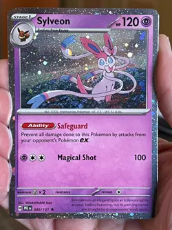 POKEMON SYLVEON 040/131 RARE COSMOS HOLOFOIL PRISMATIC EVOLUTIONS NM CARD - Image 1