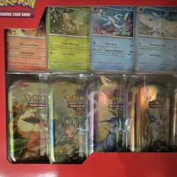Pokemon TCG Eevee Evolutions Tin Collection Box OPEN cosmo holos,coins & tins. - Image 2