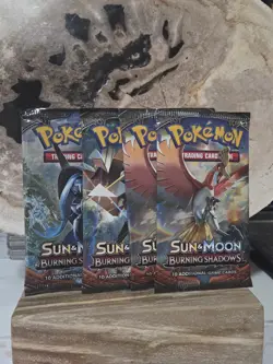 (Lot of 4) Pokemon TCG: Sun And Moon Burning Shadows Booster Pack Factory Sealed - Image 1