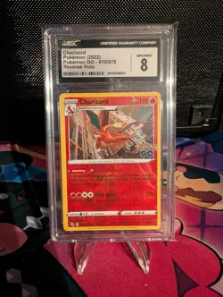 Pokemon TCG Charizard Pokemon Go 010/078 Reverse Holo Rare CGC 8 - Image 1