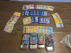 Pokemon Prismatic Evolutions Mini Tin Set HUGE LOT Of CARDS 4 Tins 2 Coins - Image 1
