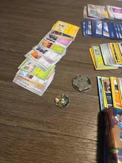 Pokemon Prismatic Evolutions Mini Tin Set HUGE LOT Of CARDS 4 Tins 2 Coins - Image 3