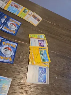 Pokemon Prismatic Evolutions Mini Tin Set HUGE LOT Of CARDS 4 Tins 2 Coins - Image 5