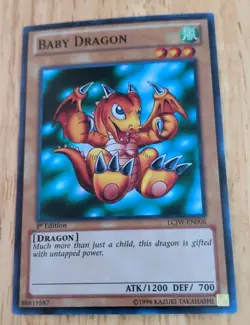 YUGIOH TCG Baby Dragon LCJW-EN006 SUPER RARE HOLOFOIL NM 1ST EDITION - Image 1