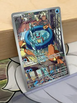 MINT – NM ~ Squirtle Illustration Rare Surging Sparks 148/142 Pokemon TCG Card - Image 3