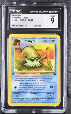 CGC MINT 9 Pokemon Omanyte 52/62 1999 Fossil 1st Edition - Image 1