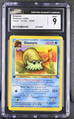 CGC MINT 9 Pokemon Omanyte 52/62 1999 Fossil 1st Edition - Image 1