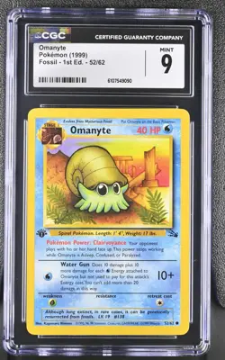 CGC MINT 9 Pokemon Omanyte 52/62 1999 Fossil 1st Edition - Image 1