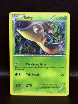 Snivy - Pokemon - BW06 Black Star Holo Promo RARE LP - Image 1