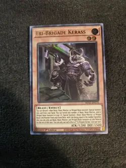 YuGiOh! - Tri-Brigade Kerass MP21-EN170 Ultra Rare 1st Edition - Image 1