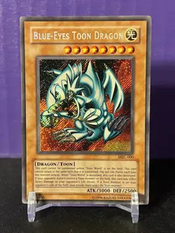 Yu-Gi-Oh TCG Blue-Eyes Toon Dragon MRL-000 Unlimited Secret Rare Card HP/DMG - Image 1
