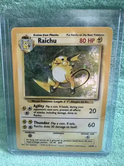 Raichu 14/102 Holo Rare Base Set Pokemon Card - Image 1