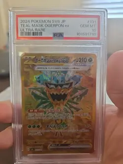 Pokemon Teal Mask Ogerpon ex Gold UR 131/101 Transformation Mask in a PSA 10 !! - Image 1