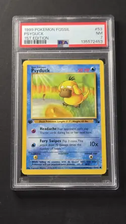 PSA 7 Psyduck 53/62 1st Edition Common Pokemon 1999 - Image 1