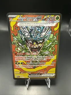 Pokemon Teal Mask Ogerpon ex 145/131 Sv: Prismatic Evolutions Holo - Image 1