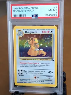 1999 Pokemon Fossil Dragonite Holo #4 - PSA 8 - NEAR MINT to MINT CLEAN - Image 1