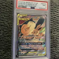 Pokemon Eevee & Snorlax 2019 SM Black Star Promo Tag Team GX SM169 PSA 9 - Image 1