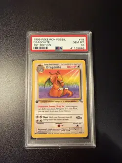 1999 POKEMON FOSSIL 1ST ED #19 DRAGONITE PSA 10 - Image 1
