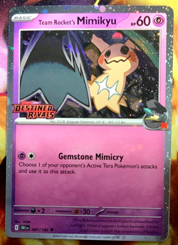 Pokemon Destined Rivals Team Rocket Mimikyu Stamped Promo 87 /182 - Image 1