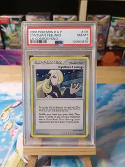 Cynthia's Feelings 131/146 Legends Awakened Cosmos Holo PSA 8 Rare Pokemon Card - Image 1