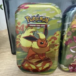 NEW! 2 Prismatic Evolution Evolutions Mini Tins Pokemon Cards SEALED WITH Coin - Image 2