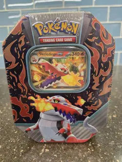 Pokemon TCG Paldea Partners Tin featuring Skeledirge ex New/Sealed - Image 1