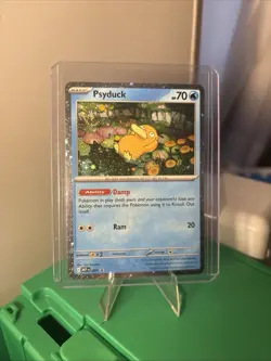 Pokemon Psyduck #7 Cosmos Holo Mega Evolution Promo ( Swirl Under HP ) - Image 1