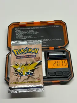1999 Pokemon Fossil 1st Edition Zapdos Artwork Booster Pack 20.75 Grams - Image 1