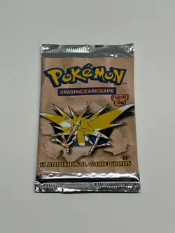 1999 Pokemon Fossil 1st Edition Zapdos Artwork Booster Pack 20.75 Grams - Image 2