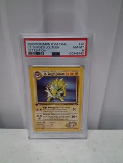 First Edition 2000 Pokemon Gym Challenge 28/132 Lt. Surge's Jolteon PSA NM-MT 8 - Image 1