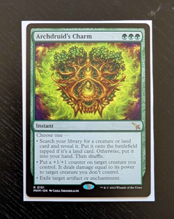 ARCHDRUID'S CHARM Rare Murders at Karlov Manor Near Mint MTG - Image 1
