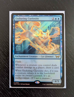 ENDURING CURIOSITY Foil Rare Duskmourn Near Mint Magic: The Gathering - Image 1