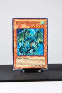 YuGiOh Strong Wind Dragon RGBT-EN003 Raging Battle 1st Edition Ultra Rare LP - Image 1