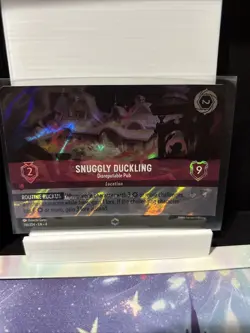 Disney Lorcana TCG Ursula's Return Snuggly Duckling Enchanted Card 216/204 - Image 1