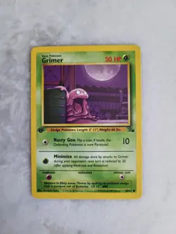 Pokemon Fossil Set 1st Edition Regular Finish Grimer 48/62 LP-NM - Image 1
