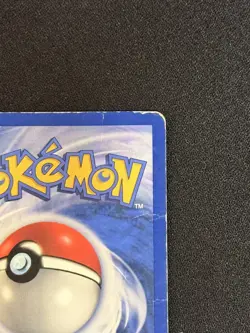 Team Rocket's Meowth 18 WoTC Black Star Promo Pokemon Card HP-DMG - Image 4