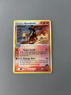 Team Magma’s Houndoom 34/95 Team Magma vs Team Aqua Reverse Holo Pokemon Card - Image 1