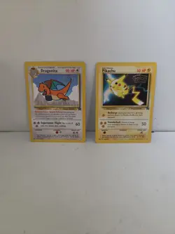Pikachu and Dragonite Black Star Promo Cards - RARE 1st Movie Promo - Image 1